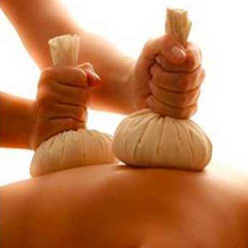 Massage with bags of Greek herbs